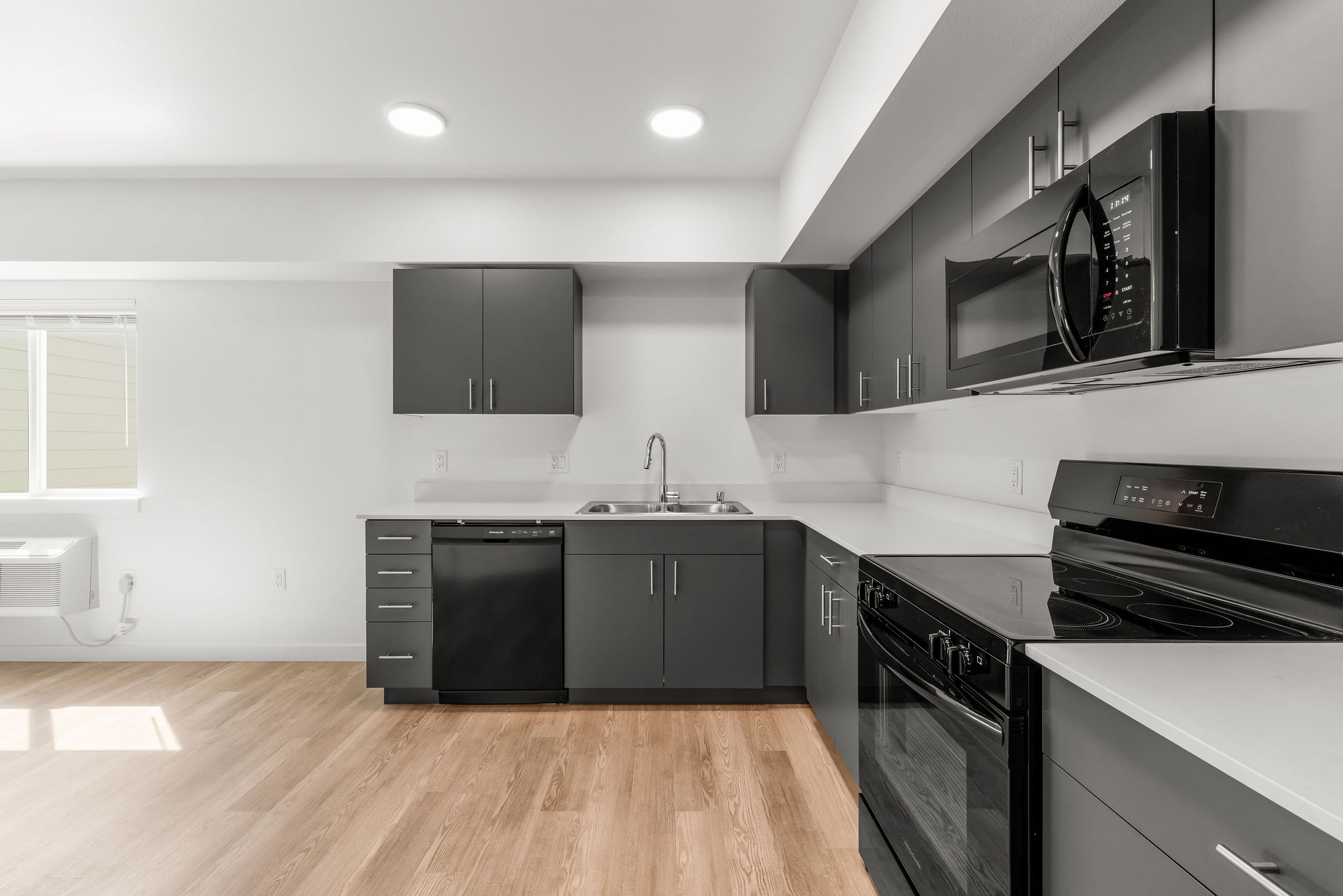 Unfurnished one bedroom unit with modern colors and bright lighting