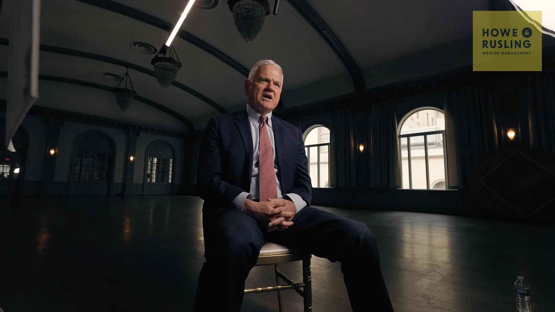Howe & Rusling wealth manager seated for an on-camera interview