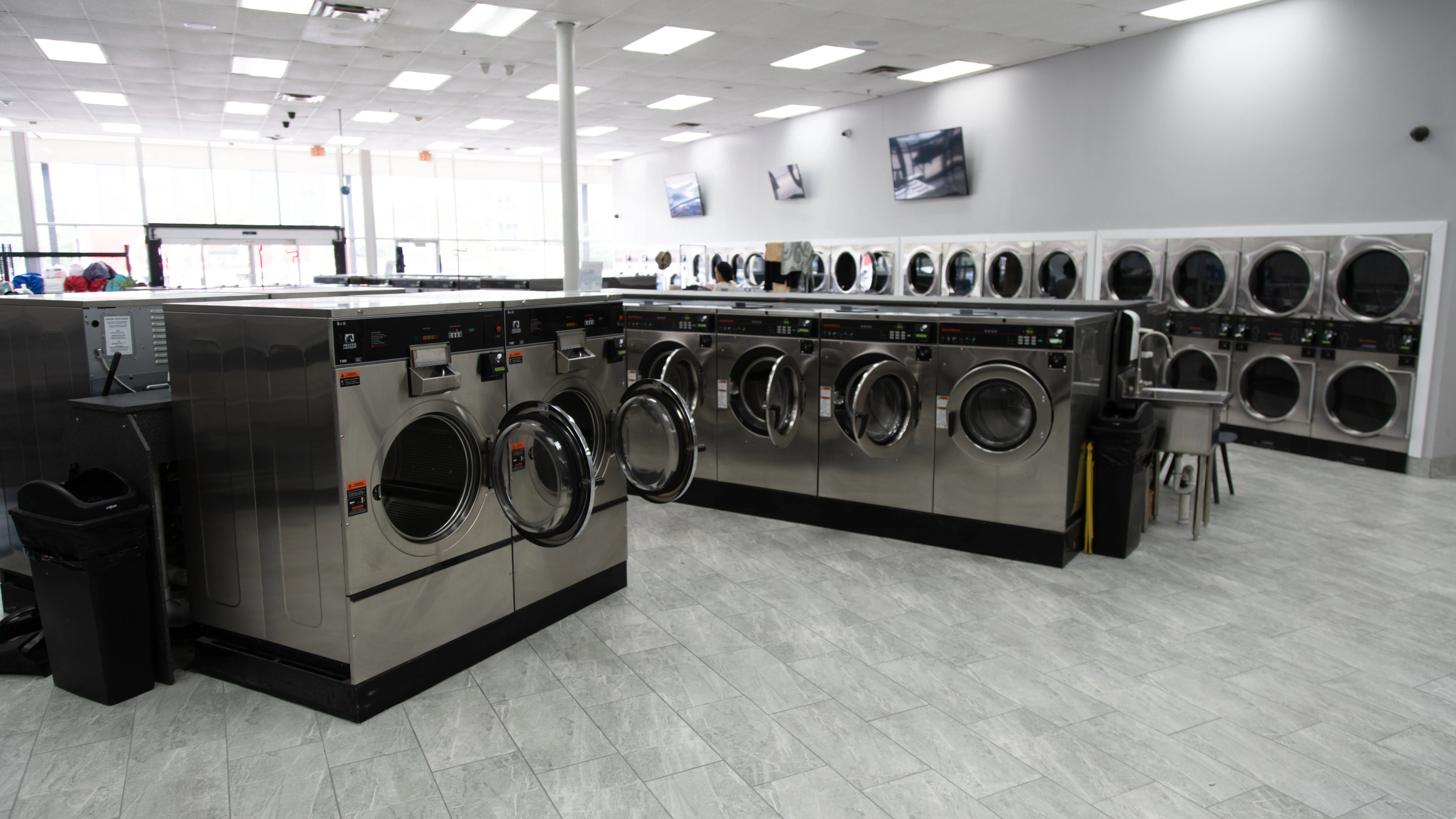 Commercial laundry machines at Lafayette Laundromat in Detroit