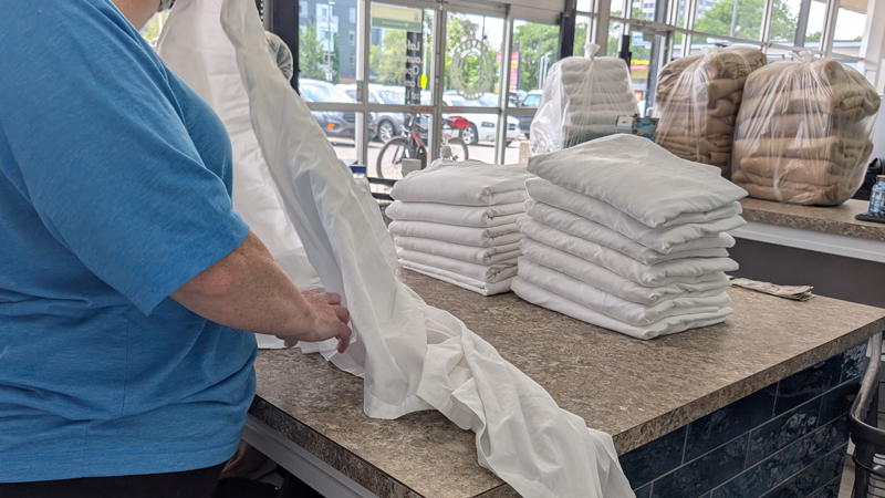 Clean folded sheets and towels