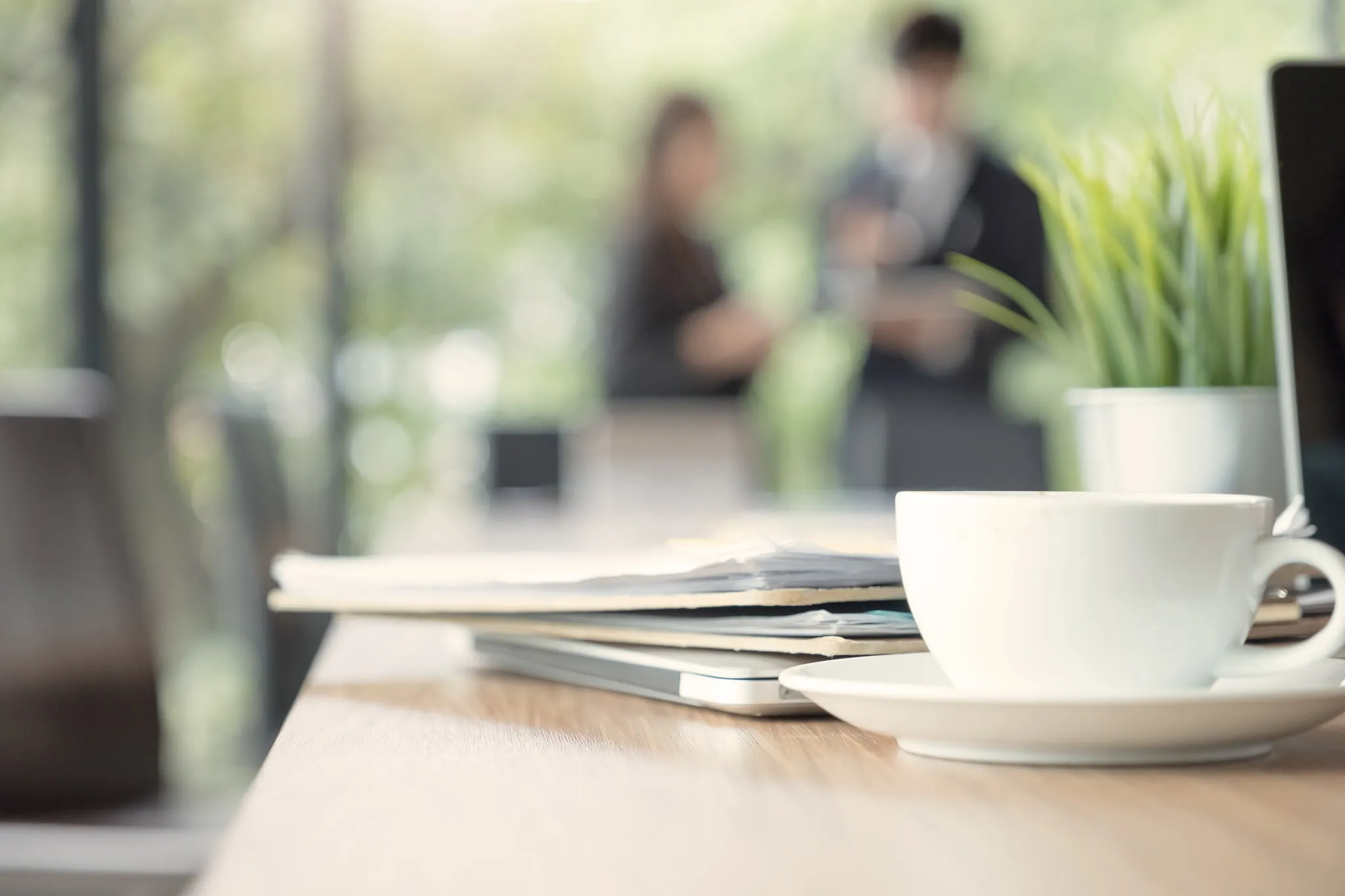 Cup of coffee and documents