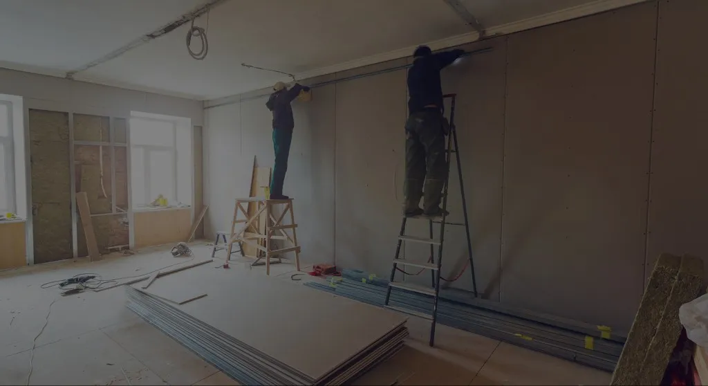 Crew reconstructing an interior after damage