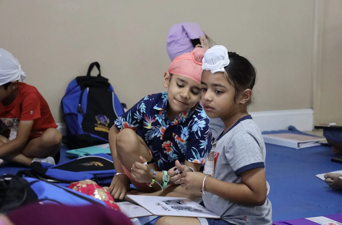 Children working together on a classroom activity.