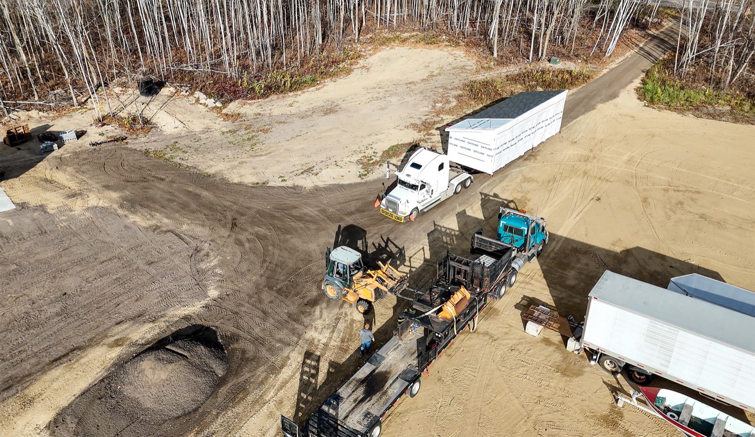 A Village Homes crew placing a home in northern Minnesota