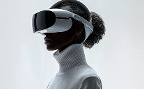 Woman in a grey turtleneck wearing a white VR headset, shown in profile against a pale background