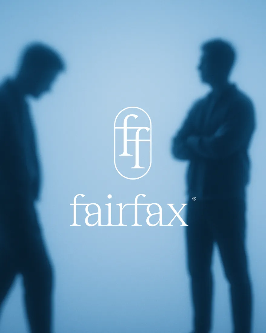 Blurred silhouettes of two men facing each other with Fairfax logo in the center on blue background.