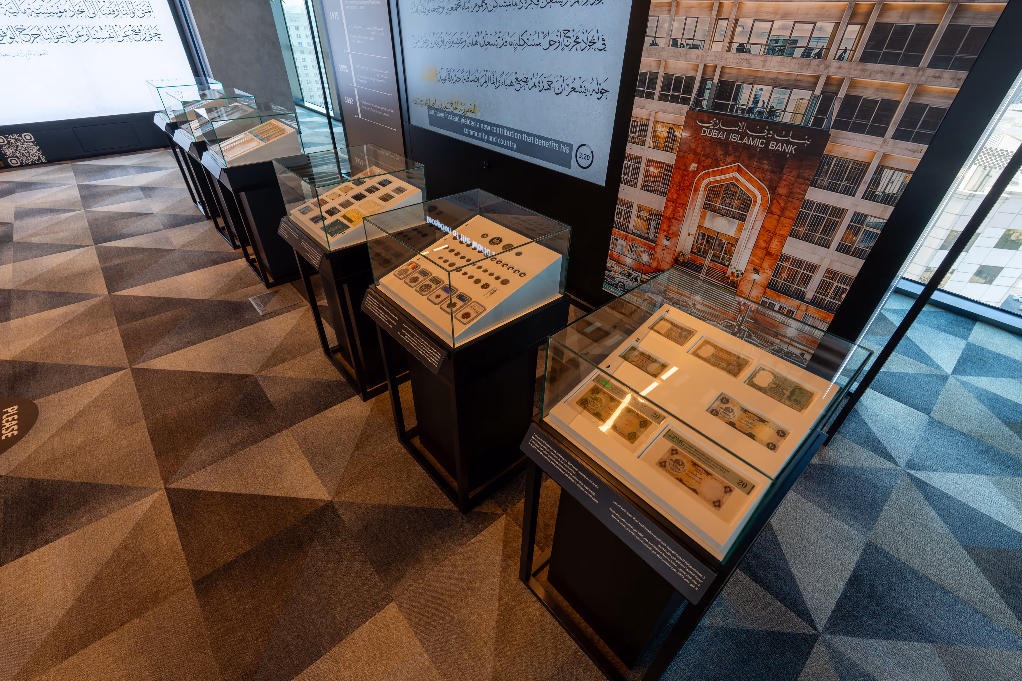 Dubai Islamic Bank heritage exhibition displaying historical banknotes and artifacts.