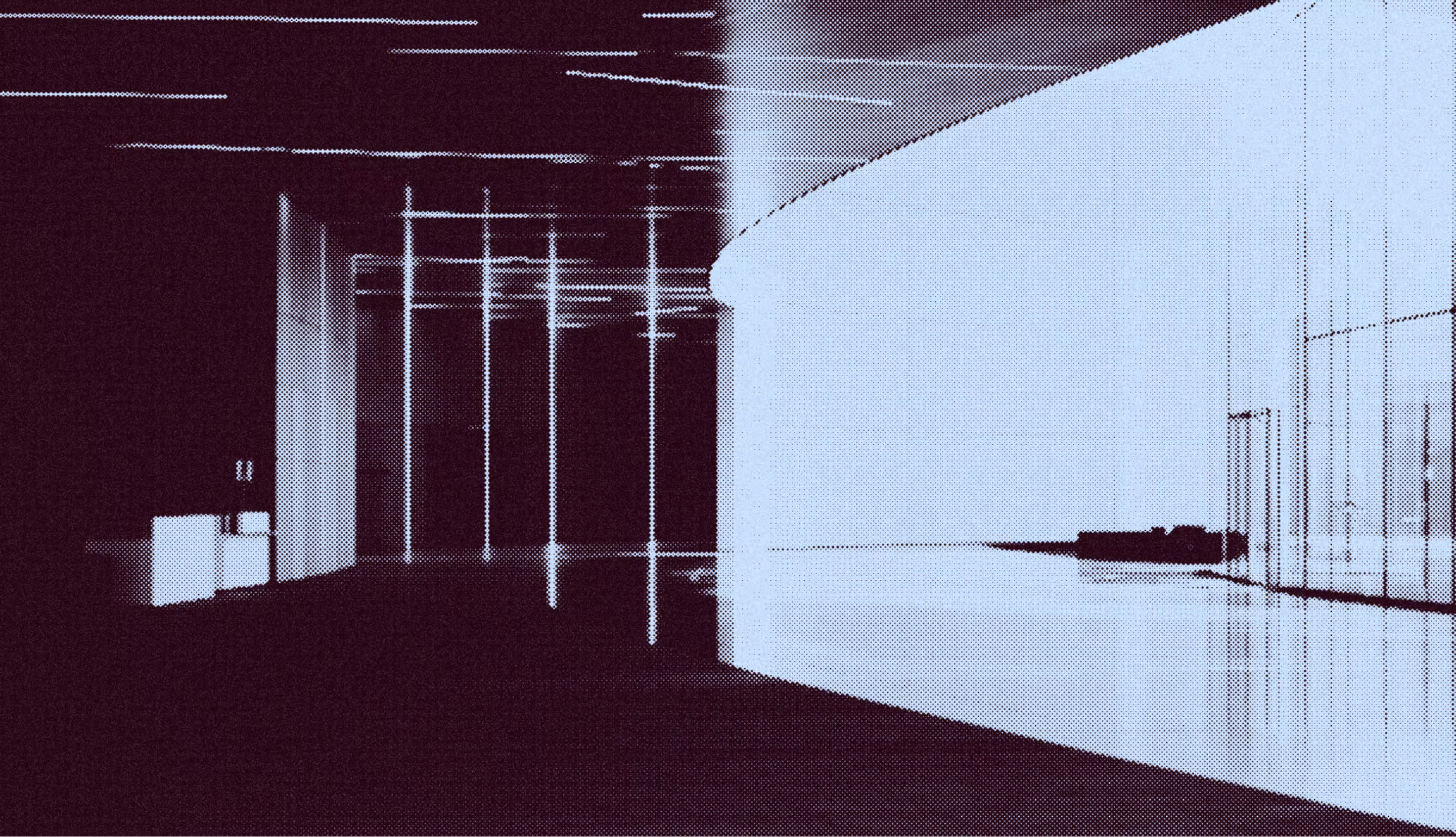 Modern interior with curved white wall, glass partitions, and reflective flooring in reception area.