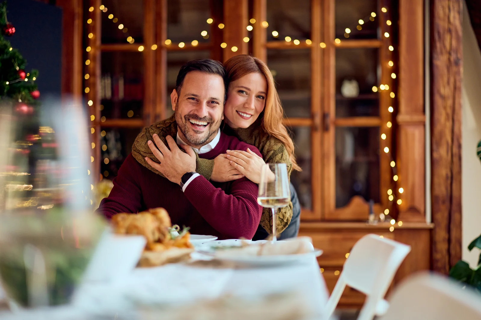 Couple at the festive table, brand photography for a hospitality venue