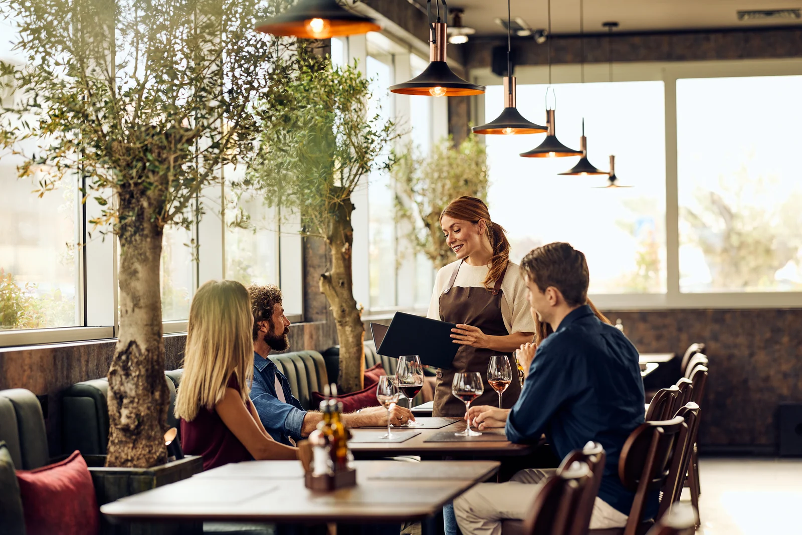 Service at the table in the dining room, brand photography for a restaurant