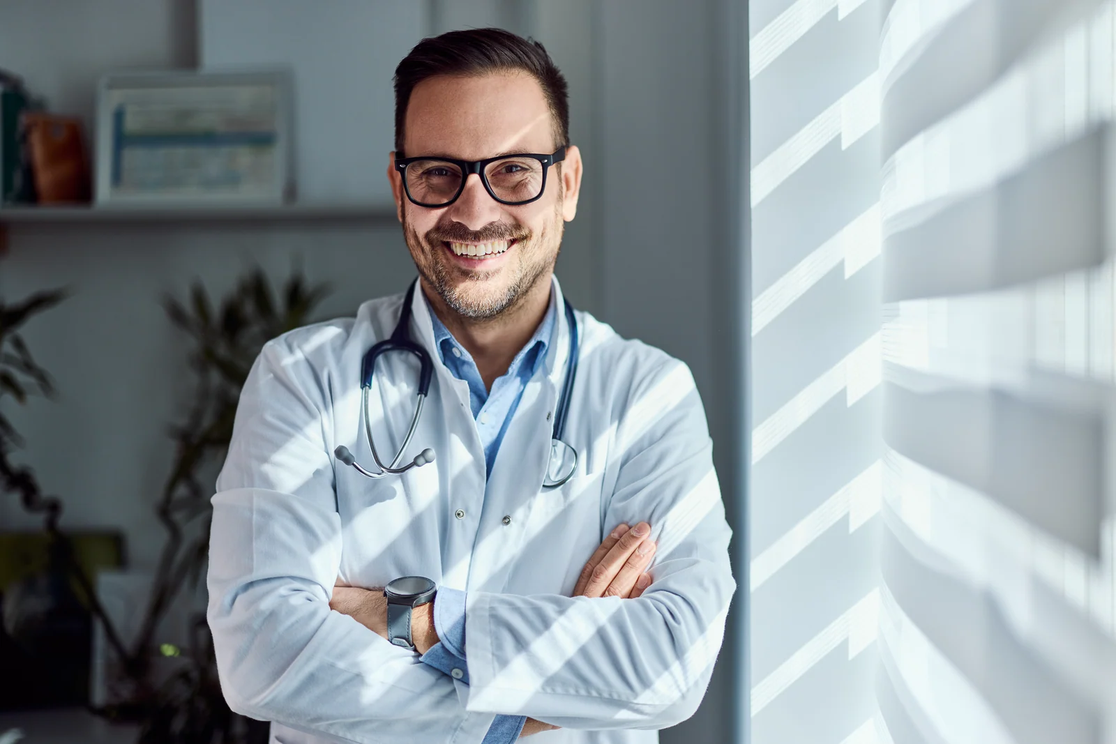 Physician in the consulting room, brand photography for a healthcare practice