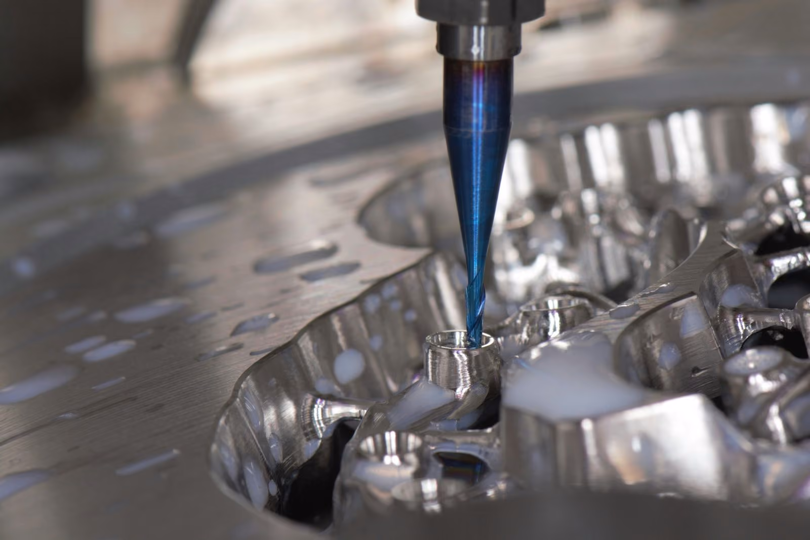 Precision drilling operation on a metal component