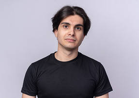 Young man with dark hair wearing a black t-shirt standing against a light gray background.