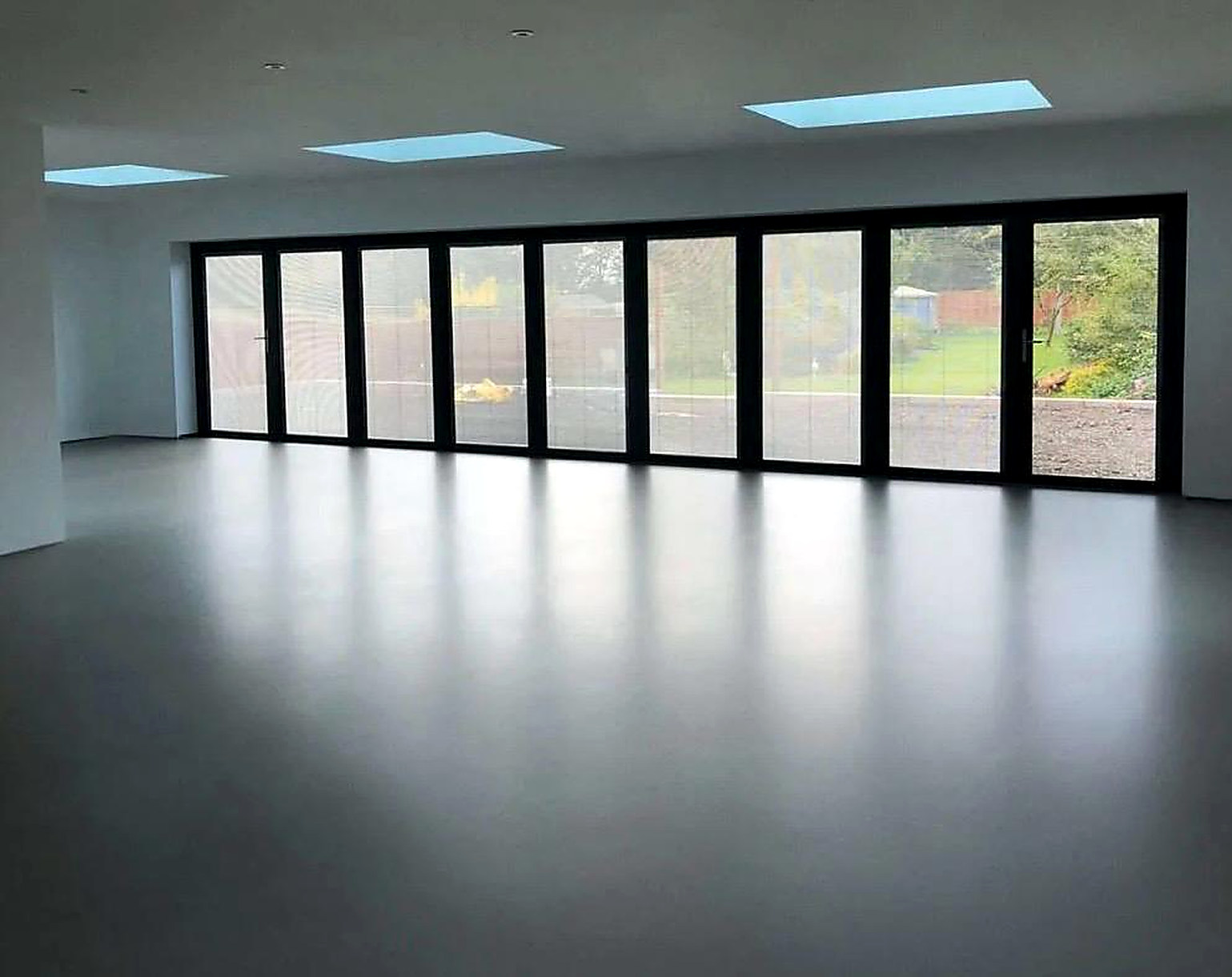 Continuous floor finish in a light-filled interior