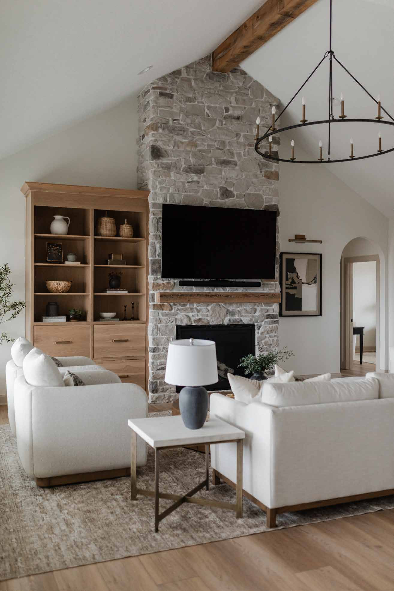 Living room with stone fireplace