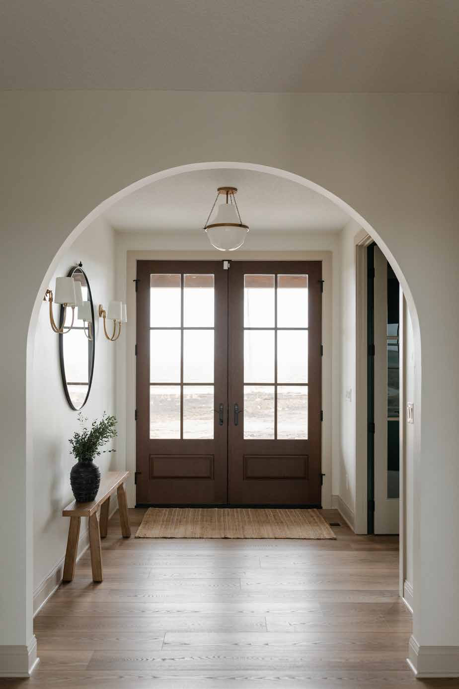 Arched entry with double doors