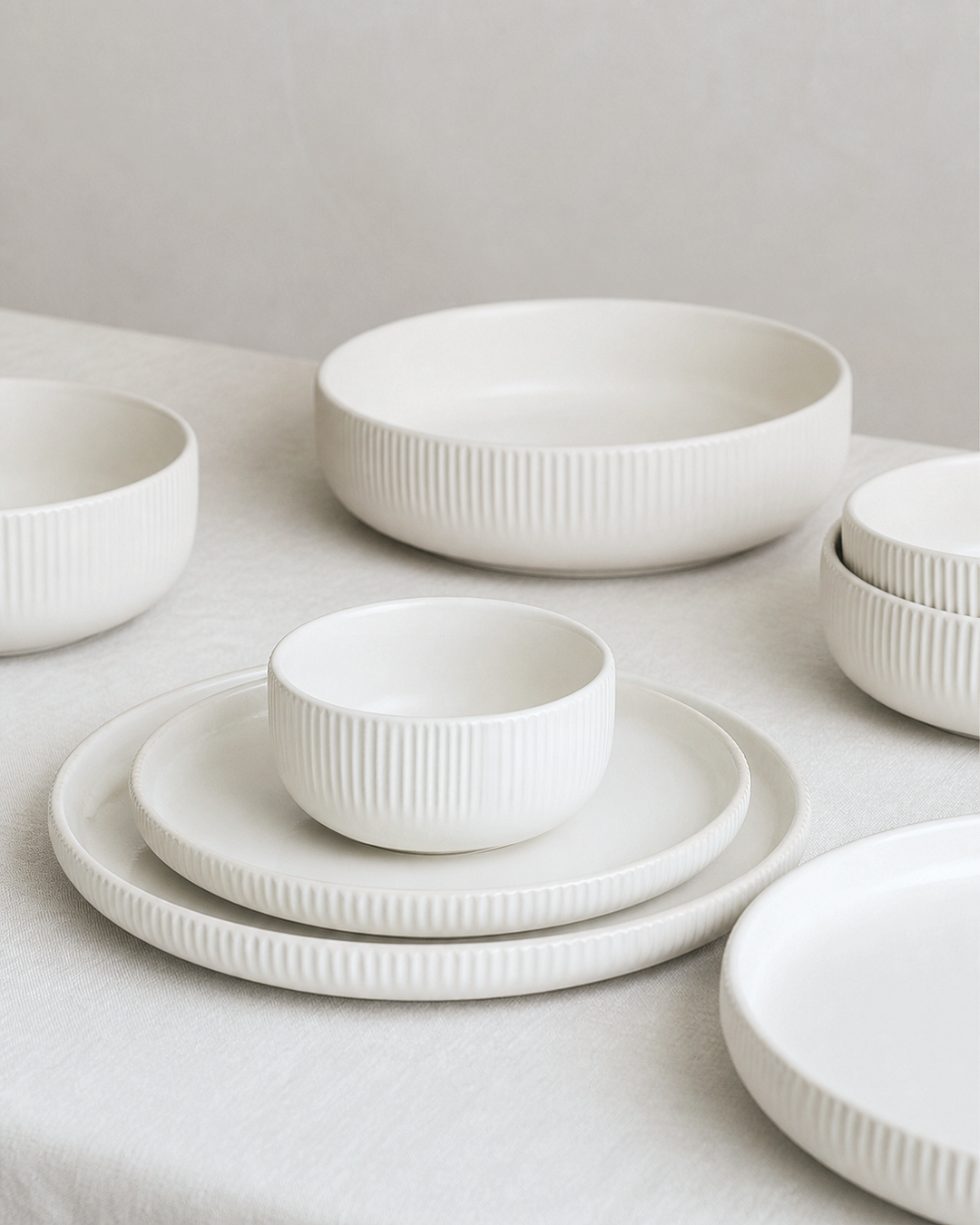 Coordinated white ribbed ceramic tableware