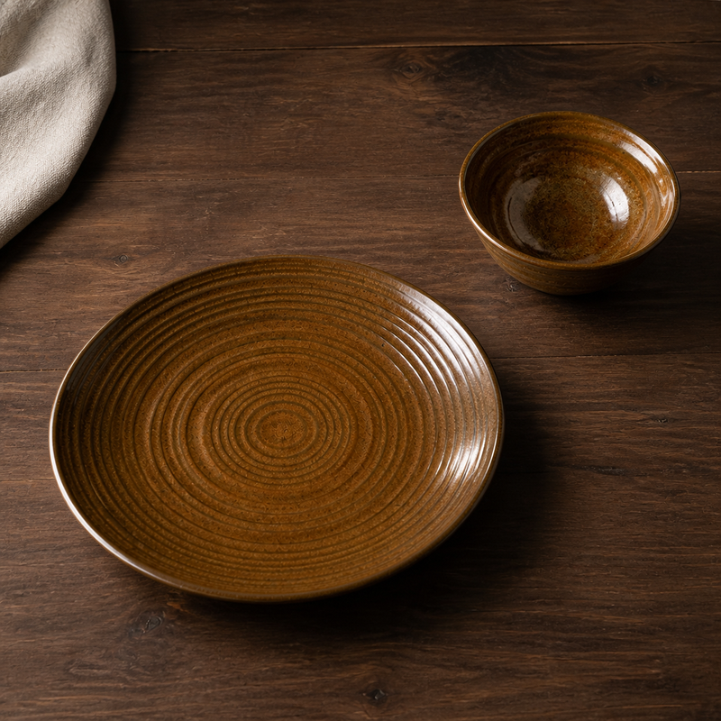 Amber reactive glaze and concentric texture detail