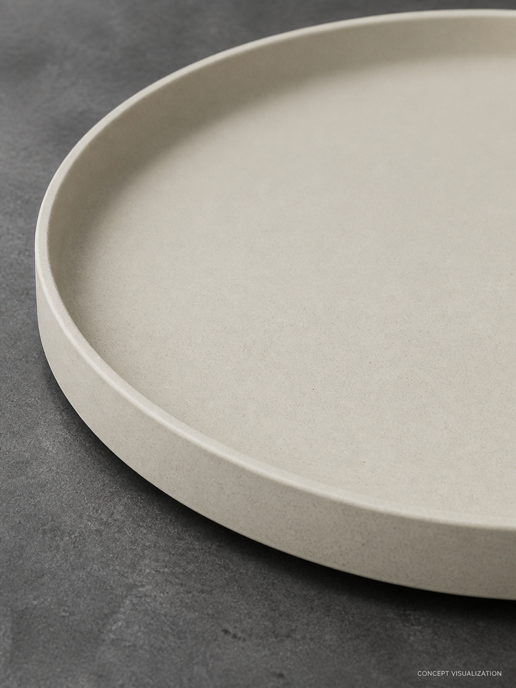 Close detail of the straight rim and finely speckled ceramic surface