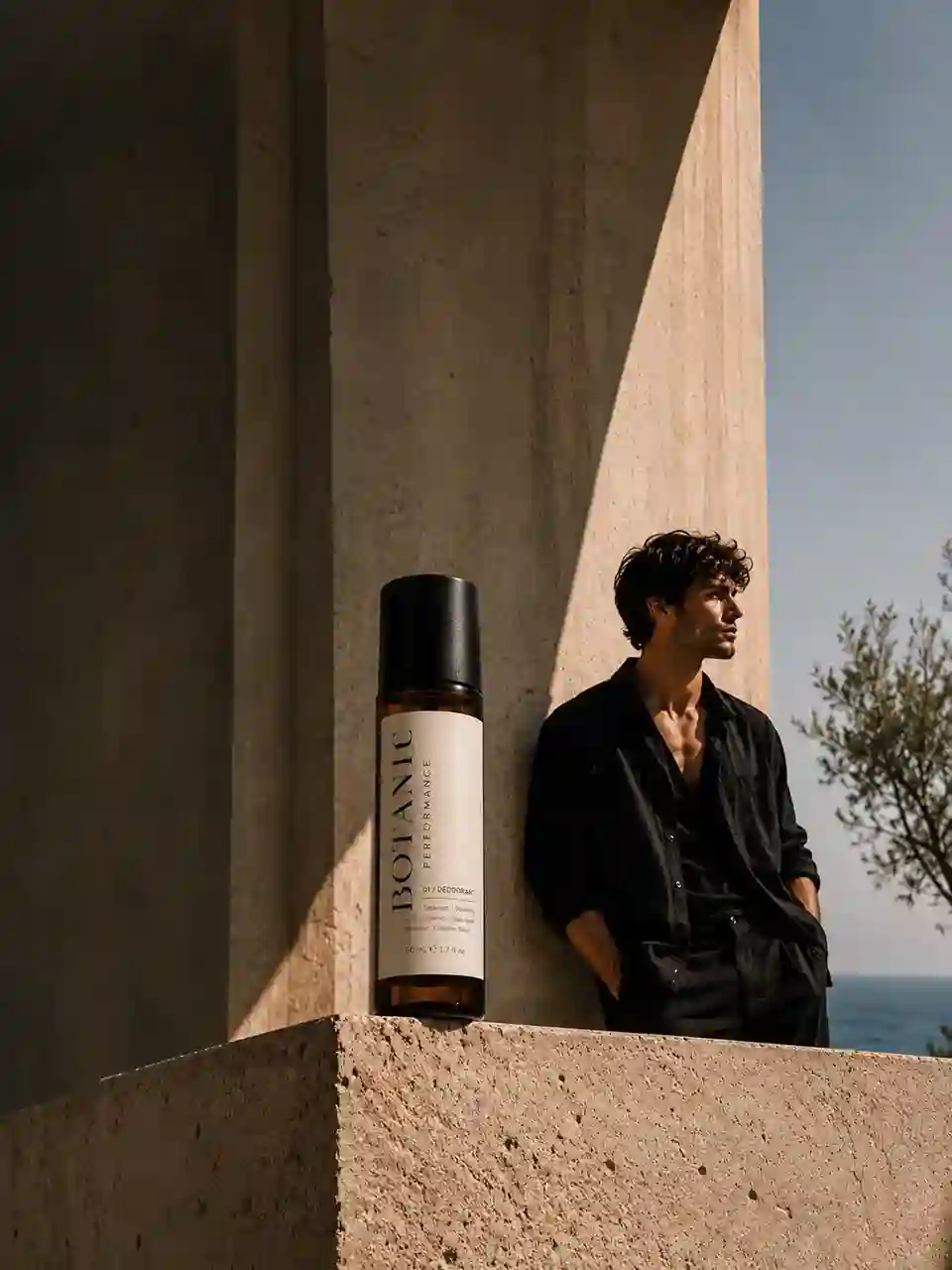 Botanic Performance 01 / Deodorant on a travertine ledge in late afternoon Mediterranean light