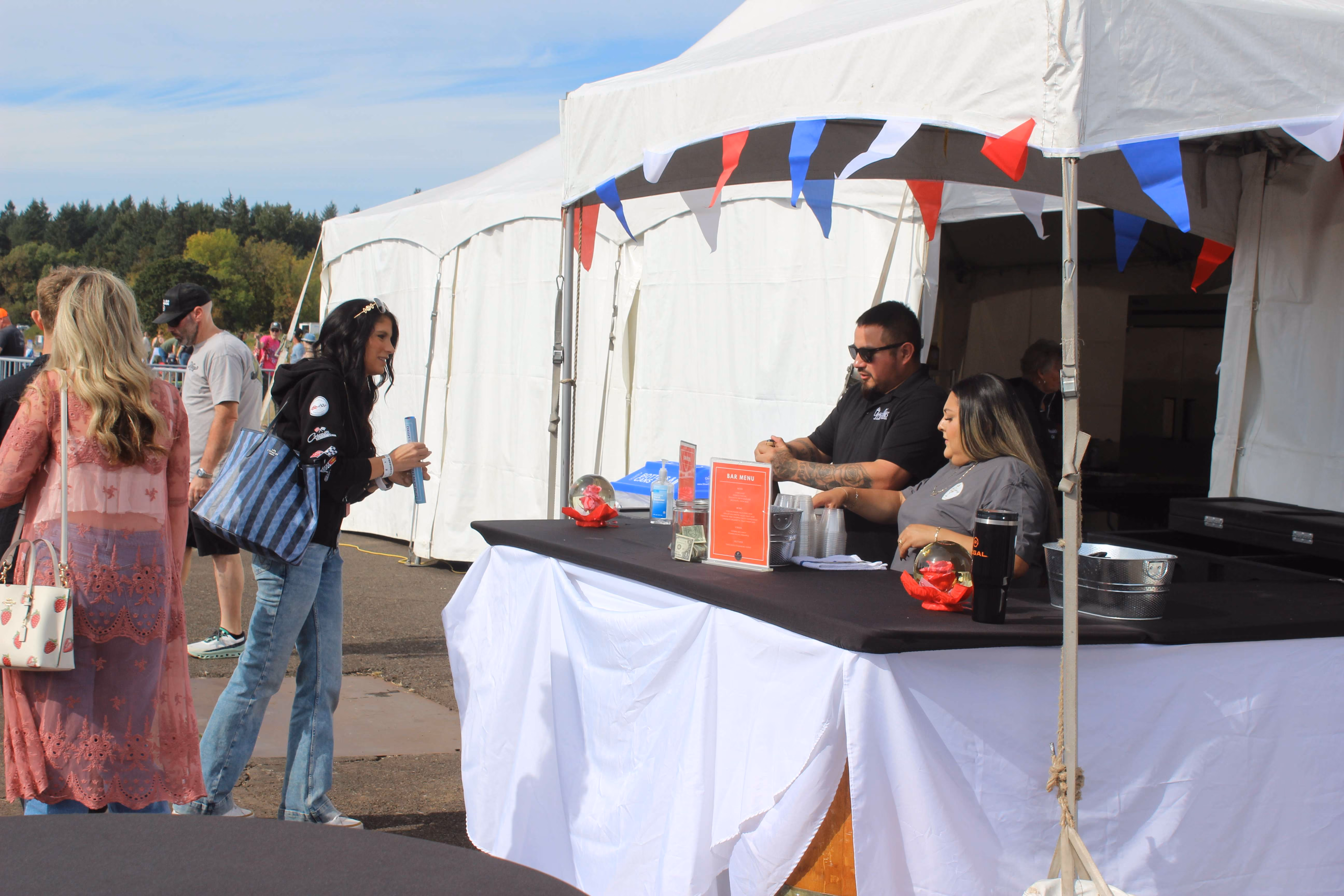 president club tent with table set up at air show