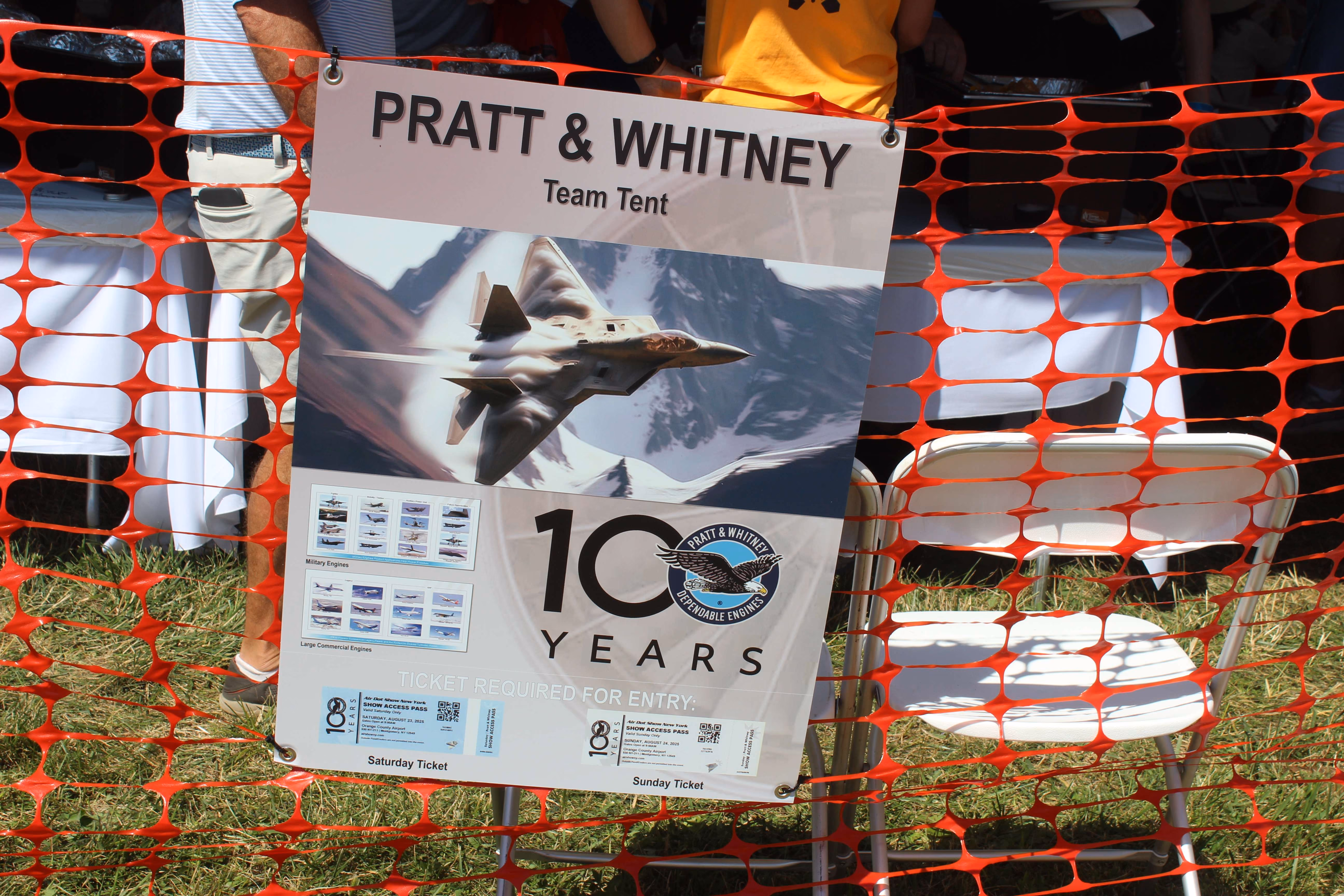 pratt & whitney tent sign in front of reserved seating area