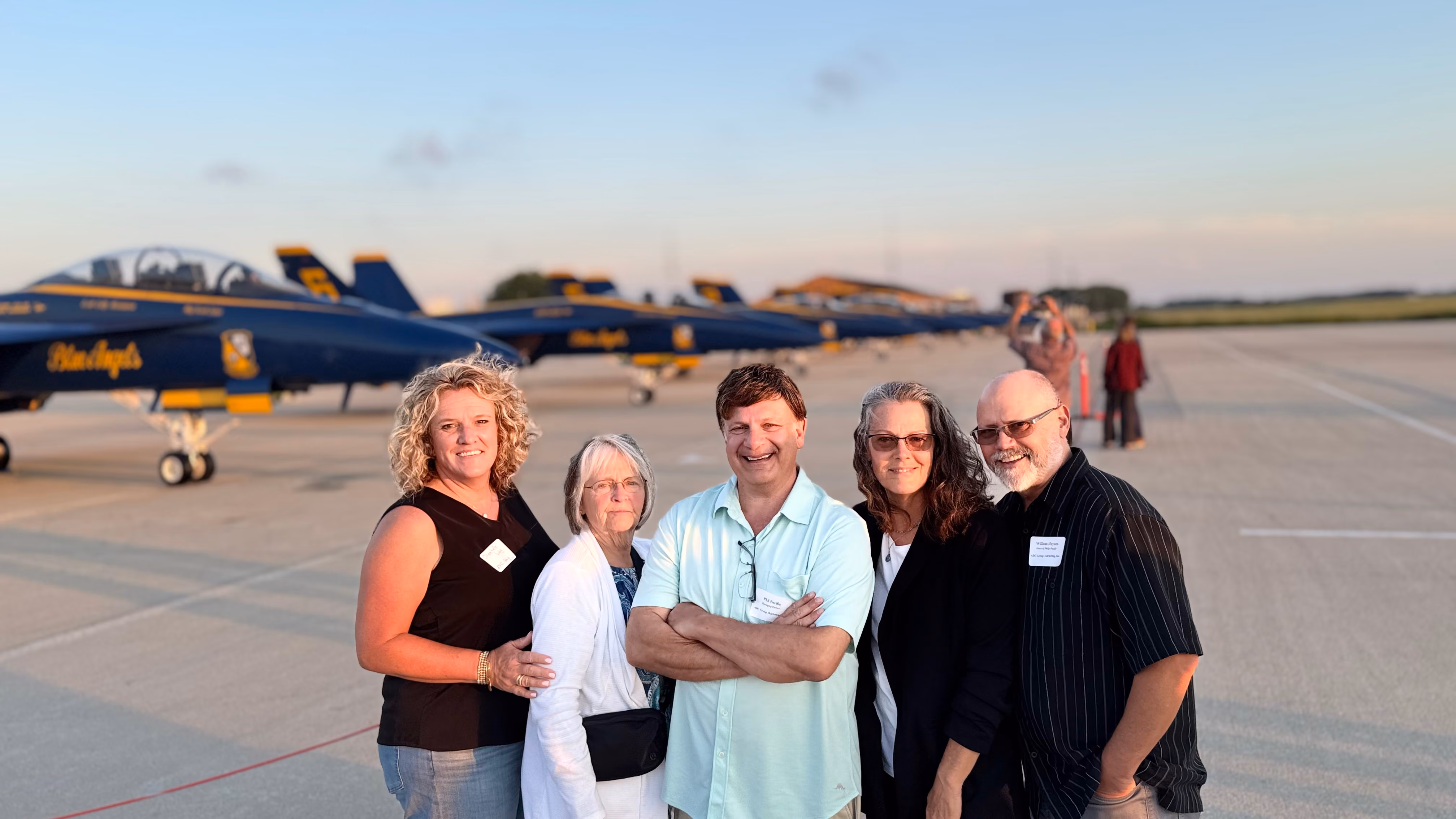 Phil Pacific and the ADC Group Marketing team at an air show with the Blue Angels