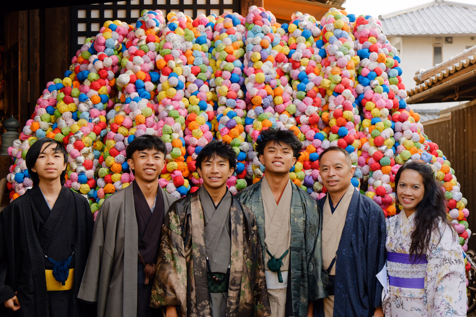 Travelers exploring traditional local streets and historic landmarks on a private walking tour in Kyoto with City Rocker Tours.