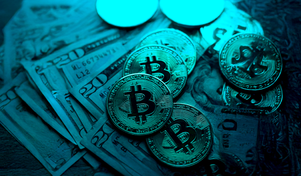 Bitcoin and cryptocurrency coins on a dark background
