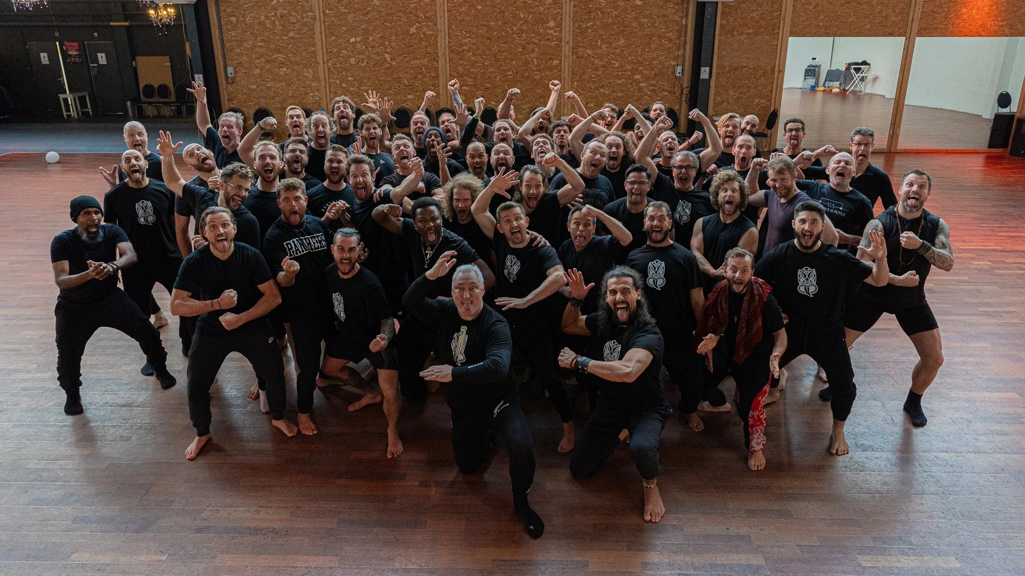 Haka 100 Strong gathering: a large group performing the haka together