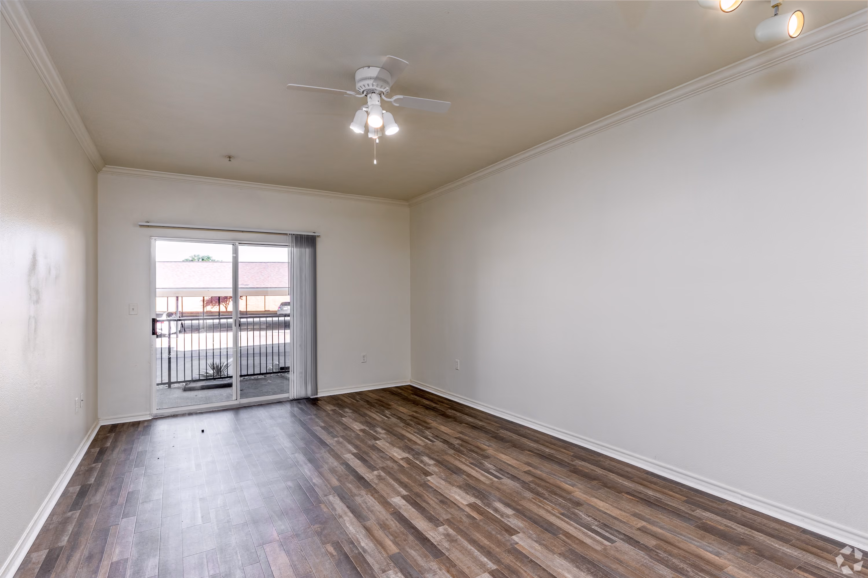 Empty apartment with carpet and white walls