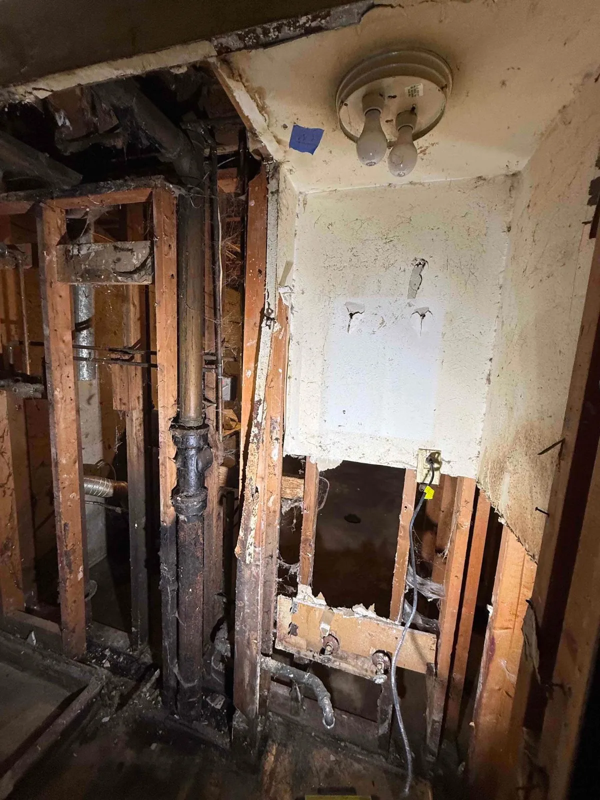 Basement drywall flood-cut above the sewage line during cleanup