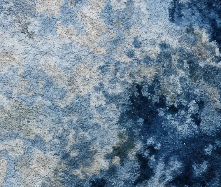 Gros plan sur une moquette bleue à fibres denses