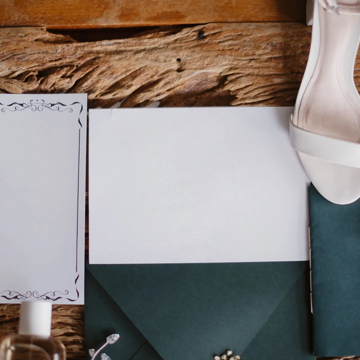 Wedding stationery laid out on a table