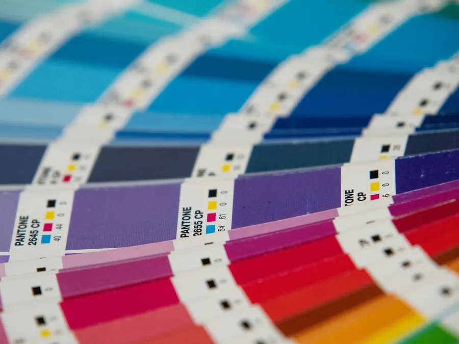 A fanned color swatch guide showing printed ink colors