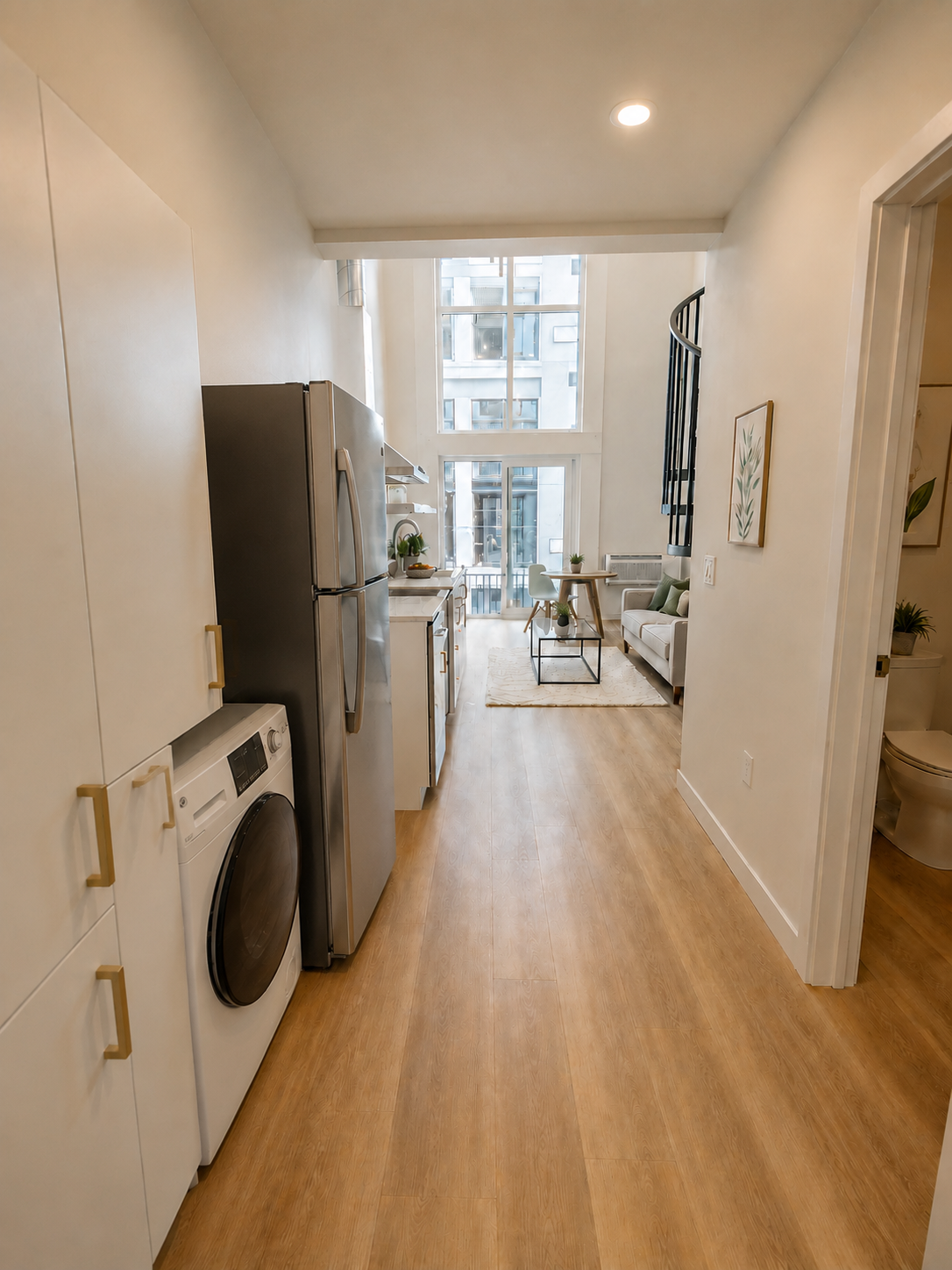 Entry, kitchen and in-unit laundry