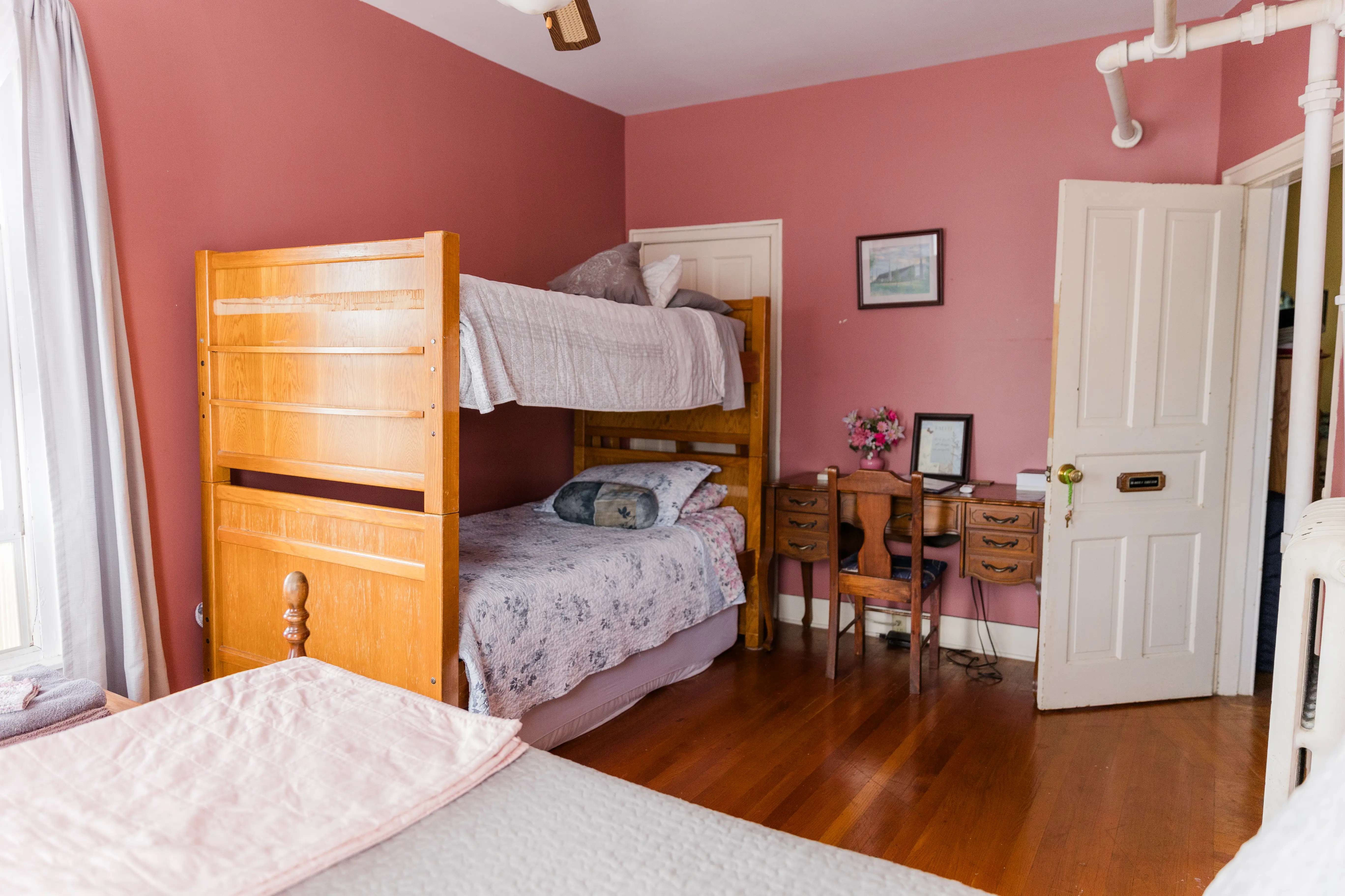 Queen bed in the Earl Starkey Room at White Tree Inn