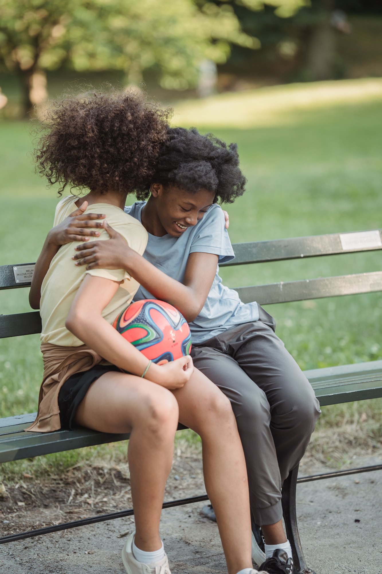 One child comforting another