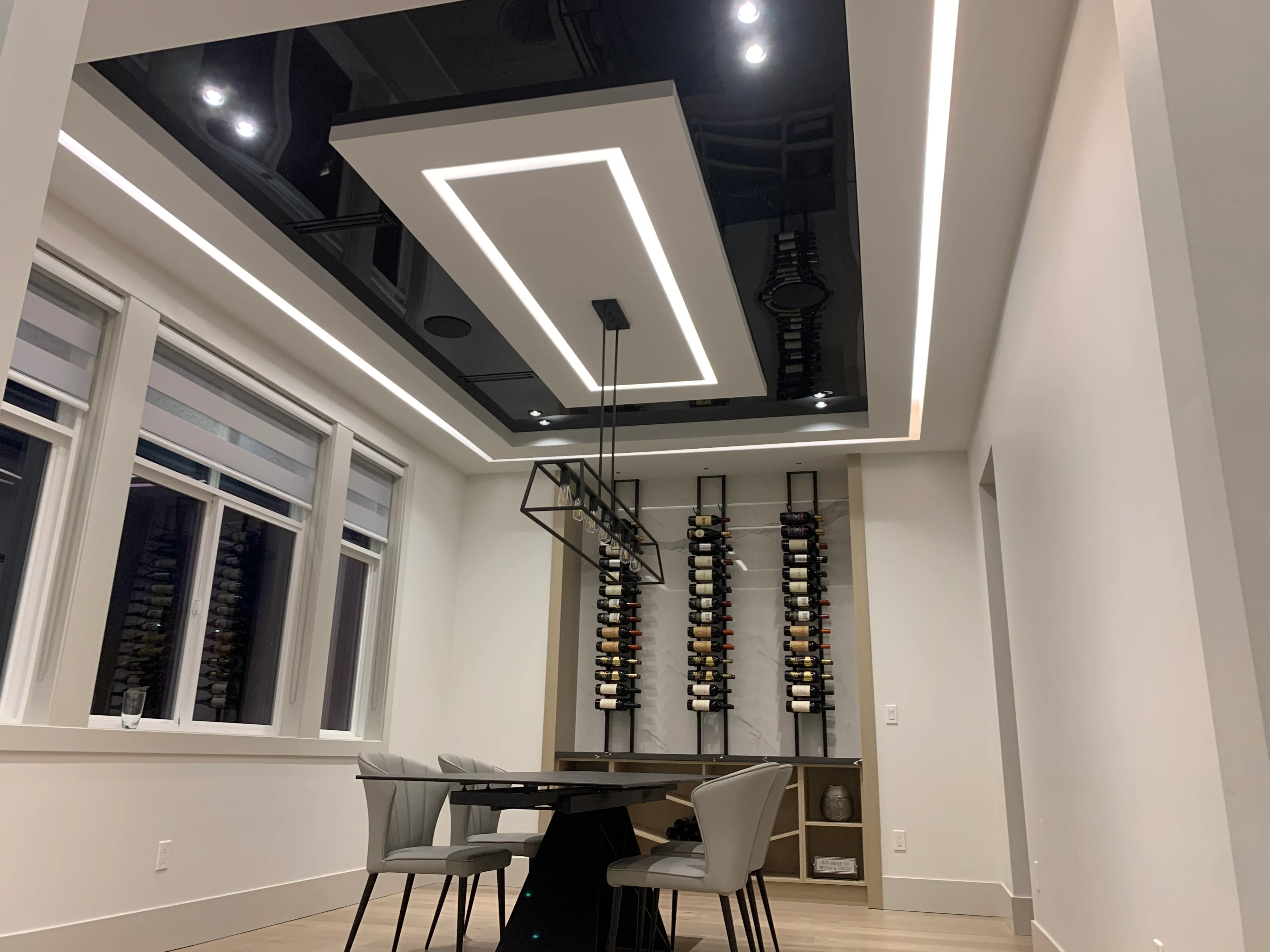 Gloss stretch ceiling coffer with recessed linear LED lighting
