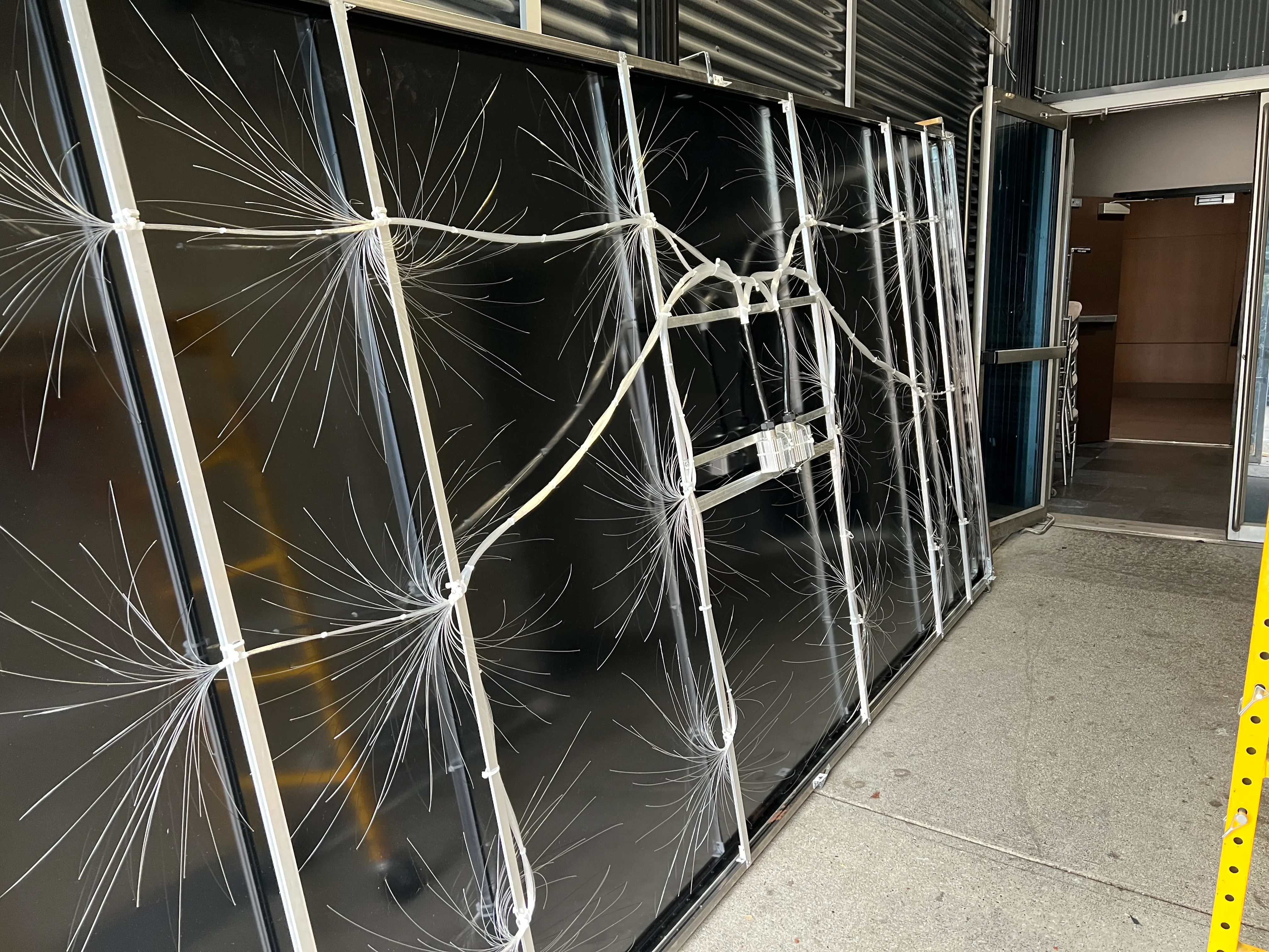 Fibre-optic star ceiling panels during off-site fabrication