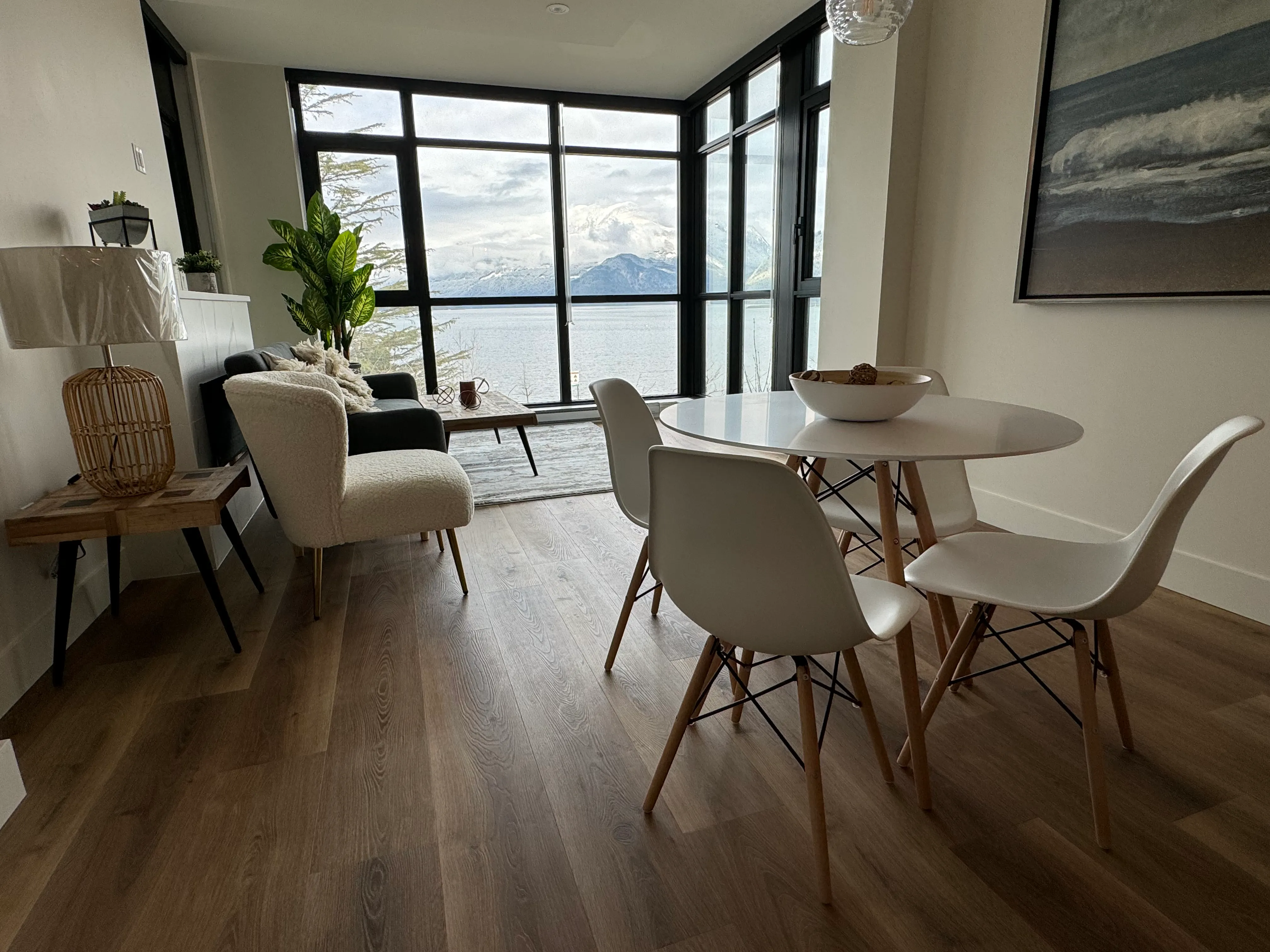 Engineered hardwood flooring installed through a bright modern living space