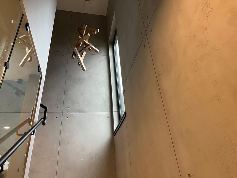 Stairwell wall with sculptural light