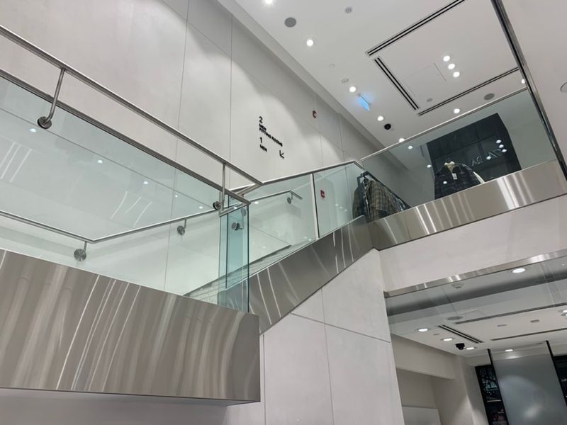 Commercial atrium with large-format microcement walls