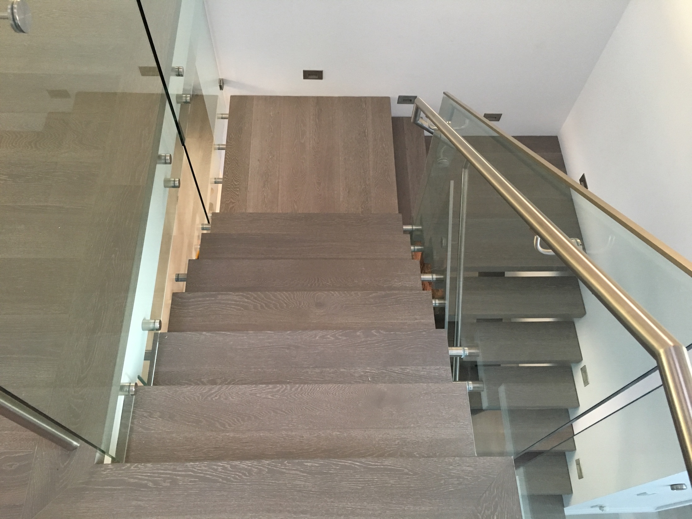 Oak stairs with glass balustrade