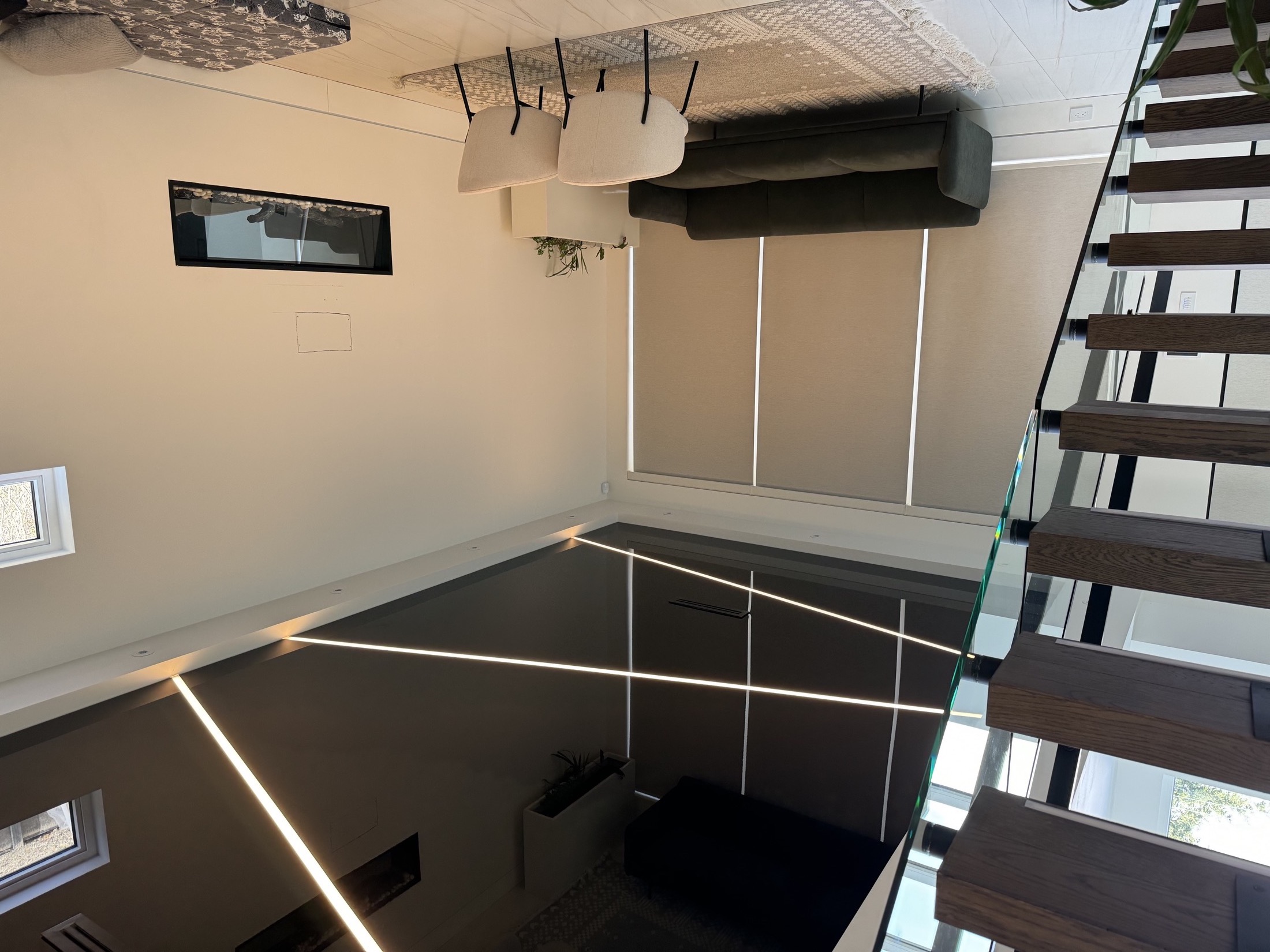Gloss stretch ceiling with warm linear LED light lines