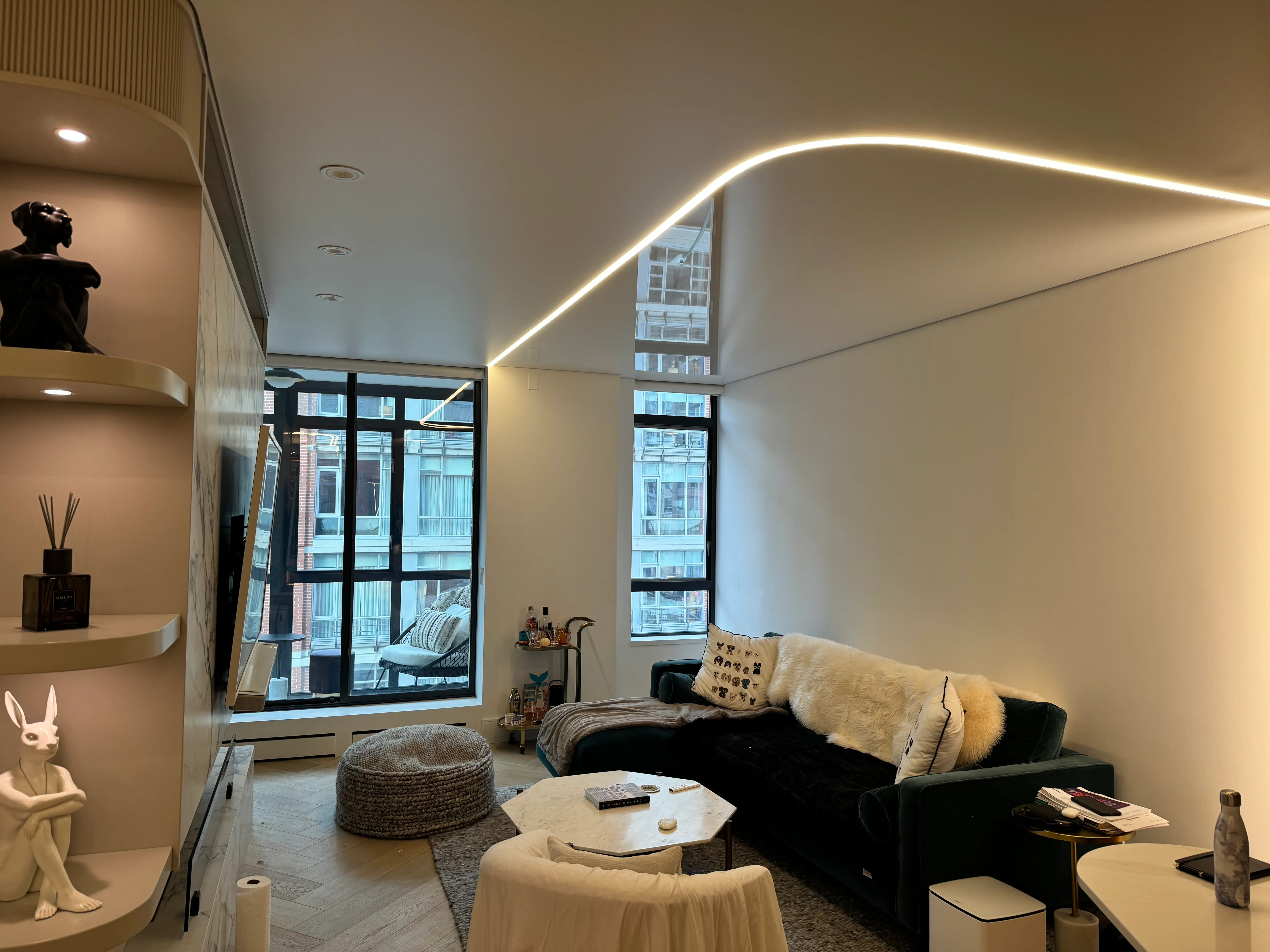 How a stretch ceiling system works, the finishes available, what has to happen above it, and the factors that genuinely move the cost of a project.