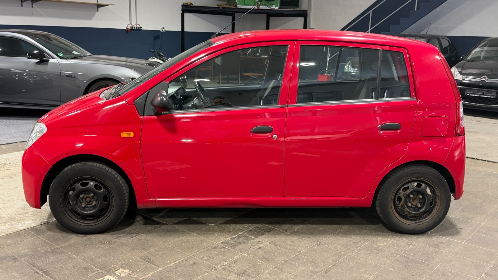 Daihatsu Cuore Blu · Klima · Radio · Regensensor – Bild 4