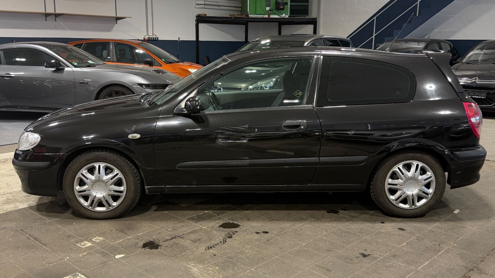 Nissan Almera CD Wechsler · EL Fensterheber · Coupe – Bild 2