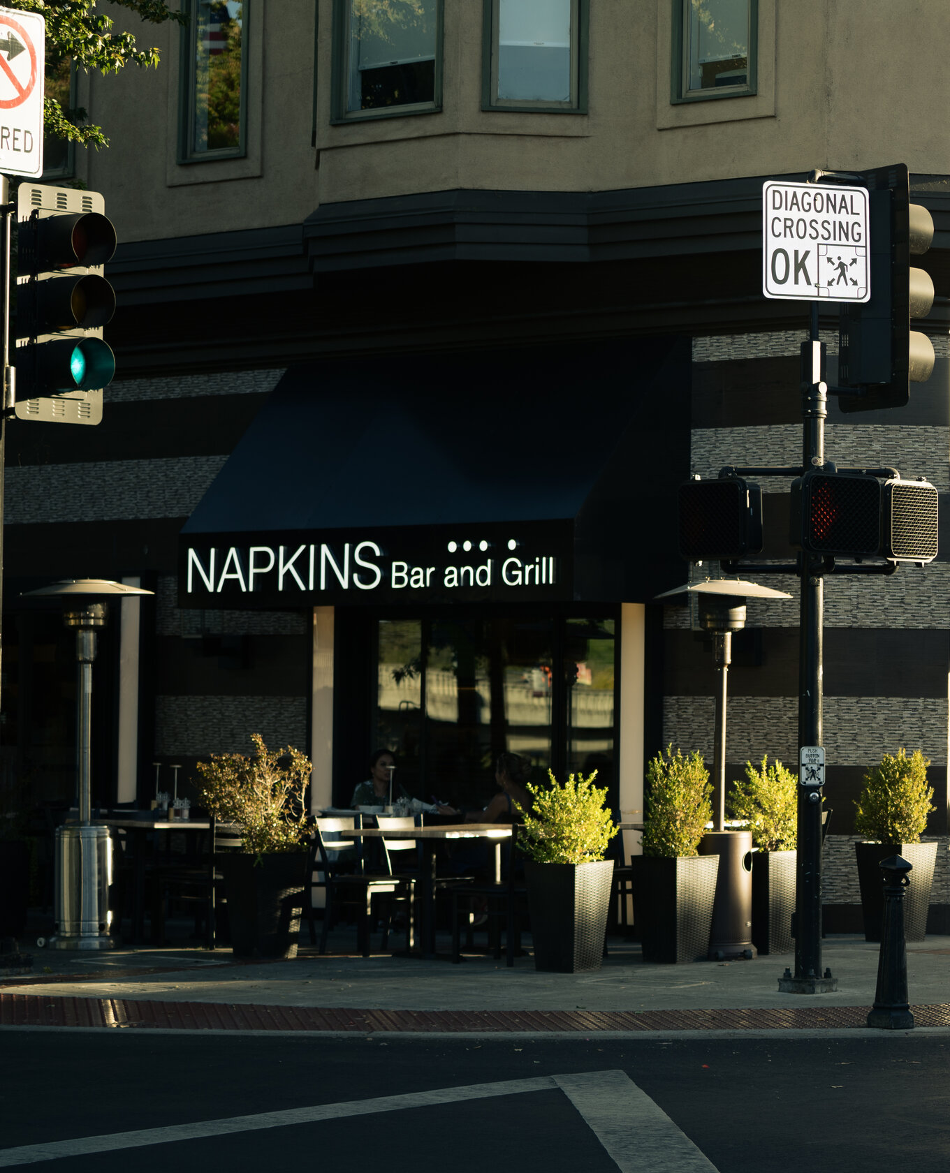 Exterior of Napkins Bar and Grill on a downtown Napa street corner