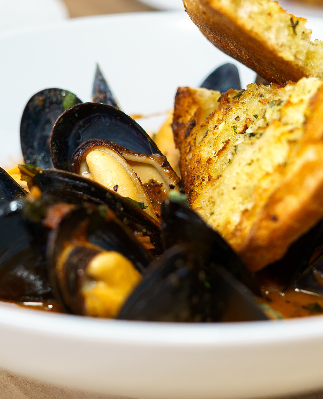Mussels with garlic toast served at Napkins Bar and Grill